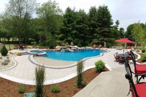 Texas Inspired Self Cleaning Geometric Inground Gunite Swimming Pool Backyard Full View
