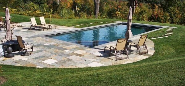 Aqua Pool & Patio gunite swimming pool construction in Connecticut showing swimming pool and patio area