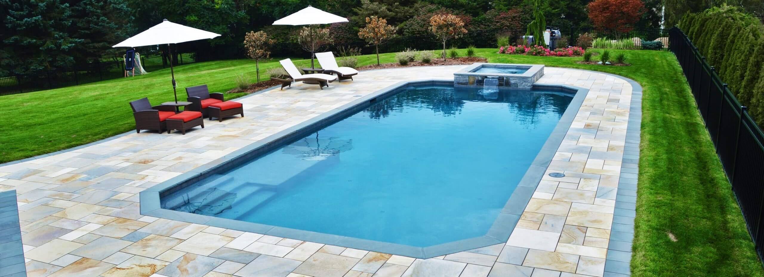 inground gunite pool with patio