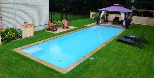 Aqua Pool & Patio gunite swimming pool construction in Connecticut showing geometric pool with seating