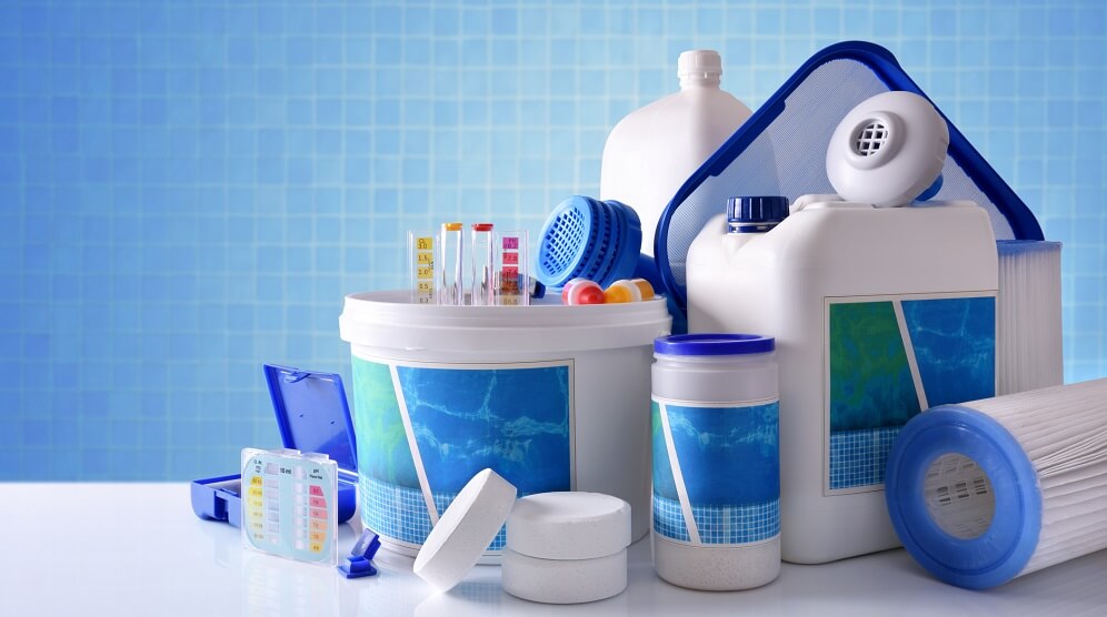 Chemical cleaning products for pool with blue mosaic background overview