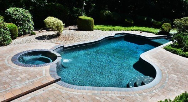 Aqua Pool & Patio gunite swimming pool construction in Connecticut showing renovated pool with spa